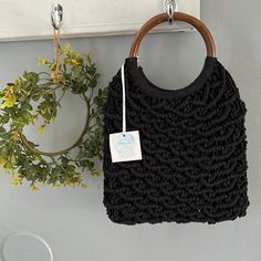 Beautiful Thick Knit Design Handbag With Stunning Wood Design Handles Handcrafted From India Casual Everyday Crochet Bag With Bamboo Handle, Casual Everyday Bamboo Handle Crochet Bag, Chic Black Handwoven Bucket Bag, Black Handheld Handwoven Straw Bag, Handmade Black Bags With Double Handle, Black Straw Tote Bag With Handles, Black Tote Straw Bag With Handles, Black Bag With Round Handles, Daily Use Crochet Tote Bag With Bamboo Handle