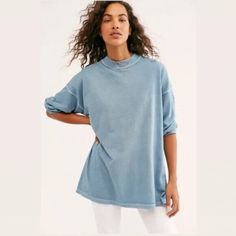 Elevate Your Wardrobe With This Stylish Free People Mock Neck T-Shirt In Blue. This Versatile Piece Features Long Sleeves And A Solid Pattern, Making It Perfect For Any Occasion. The Shirt Is Made From High-Quality Materials And Designed With A Regular Size Type For A Comfortable Fit. The Mock Neck Adds A Touch Of Sophistication To The Basic Style, And The Xs Size Ensures A Flattering Fit For Petite Frames. Whether You're Dressing Up For A Night Out Or Keeping It Casual, This Free People T-Shirt Relaxed Washed Blue Cotton Top, Casual Blue T-shirt For Layering, Oversized Soft-washed Blue Top, Oversized Soft-washed Washed Blue Top, Spring Blue Sweatshirt, Spring Blue Everyday Sweatshirt, Everyday Blue Spring Sweatshirt, Everyday Blue Sweatshirt For Spring, Relaxed Blue Long Sleeve Top