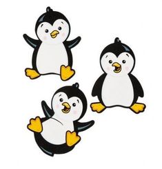 three penguins with yellow feet and black beaks