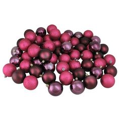 a pile of red and purple christmas balls