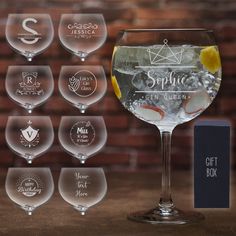 wine glasses with different designs and names on them