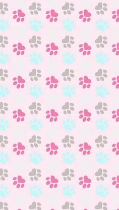 a pink and gray dog paw print on a white background with hearts in the middle