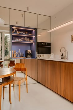 the kitchen is clean and ready to be used as a dining room or office area