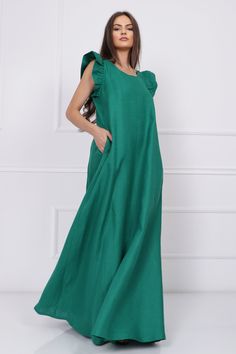 "Discover the epitome of effortless elegance with our green maxi linen dress for women. This dress offers a perfect blend of comfort and style, making it an ideal choice for those who appreciate minimalist fashion without compromising on sophistication. Crafted from high-quality linen, this sleeveless dress is designed to keep you feeling comfortable and chic, whether you're enjoying a casual day out or dressing up for a special occasion. Features: 🌟 Refreshing Green Hue: The refreshing green c Solid Linen Maxi Dress For Spring, Green Linen Beach Dress Elegant, Elegant Green Linen Beach Dress, Casual Green Linen Maxi Dress, Green Casual Maxi Linen Dress, Casual Green Maxi Linen Dress, Linen A-line Maxi Dress, Green Linen Maxi Dress For Summer, Spring Green Linen Maxi Dress