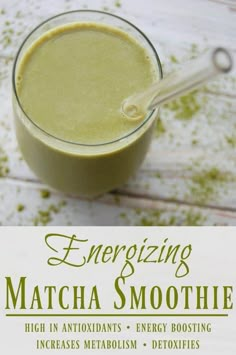 an energizing matcha smoothie in a glass with a spoon on the side