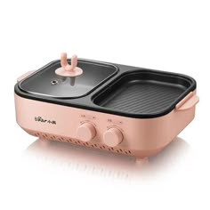 an electric toaster with two hot plates on it