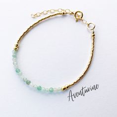 This beautiful aventurine gemstone bracelet is handcrafted with 3mm natural green aventurine beads. The gold beading is done with high quality Japanese Miyuki Duracoat delica seed beads. The larger round gold beads are 14k gold filled for lasting quality. A 14k gold filled spring clasp completes the look. It's the perfect bracelet for layering or wearing all on its own! It's simple, yet elegant design makes it a great option for every day wear. This bracelet can be purchased in either 14k gold f Elegant Aventurine Beaded Bracelets For Healing, Gold Jade Beaded Bracelets For Spiritual Purposes, Gold Jade Beaded Bracelets For Spiritual Wear, Spiritual Gold Jade Beaded Bracelets, Adjustable Aventurine Beaded Bracelets, Gold Jade Crystal Bracelet With Natural Stones, Adjustable Aventurine Gemstone Bead Bracelets, Amazonite Gemstone Beads Bracelet For Everyday, Everyday Amazonite Gemstone Beads Bracelet