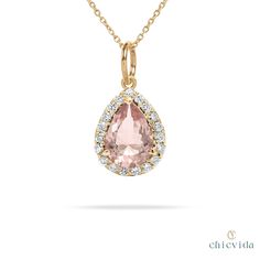 "Here's Pear Shape Morganite Halo Pendant, skillfully crafted in 14k/18k Solid Gold to showcase the natural charm of Pink morganite. This pendant is perfect for any event. Enjoy the simplicity and beauty of this easy-to-wear jewelry piece." Pink Morganite Pendant,Teardrop Morganite Necklace,14k Solid Gold Halo Necklace,Minimalist Pendant for Women,Statement Jewelry Gift for Her ★ ★ ★ ★  CUSTOM/DUTY-FREE SHIPPING WORLDWIDE, BUYERS DON'T HAVE TO PAY ANY CUSTOM FEES WHILE IMPORTING ★ ★ ★ ★  Details Made to order Material: 14k/18k gold Color Options: Yellow Gold, White Gold, Rose Gold ★ Center Stone Natural Pink Morganite, Pear Size: 5 x 7 mm  Approx Weight (Ct): 0.60 ★ Accent Stones Diamond/Moissanite Round Size: 1.1 mm * 33 Nos.   Approx Weight (Ct): 0.20 ★ Ring Height: 9.5 mm ★ Band Width: Yellow Gold Teardrop Jewelry With Halo Setting, Yellow Gold Teardrop Gemstone Drop Necklace, Yellow Gold Teardrop Halo Jewelry, Teardrop Halo Setting Necklace As Gift, Teardrop Necklace With Halo Setting As Gift, Morganite Teardrop Jewelry Gift, Pear-shaped Gemstone Drop Necklace In Yellow Gold, Yellow Gold Pear-shaped Gemstone Drop Necklace, Elegant Pink Pear-shaped Necklace