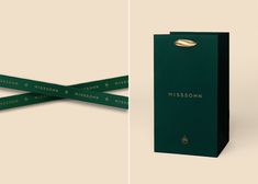 two different views of a green box with a gold ribbon on it and the same image as shown