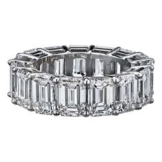 15.53 Carat Emerald Cut GIA Certified Diamond Eternity Ring. GIA certified Emerald-cut diamond eternity band ring, showcasing fifteen colorless diamonds weighing 15.53 total carats, mounted in a shared prong platinum setting. The diamonds are each slightly over one carat with D-E-F color and VVS2-VS2 clarity. Each diamond has it's own certificate. Width: 7mm Size 7. GIA certificates included. Gold Trinity Ring, Emerald Cut Diamond Eternity Band, Forever Diamonds Ny, Emerald Cut Eternity Band, Pink Diamond Engagement Ring, Emerald Wedding Band, Emerald Cut Diamond Ring, Flawless Diamond, Diamond Eternity Ring