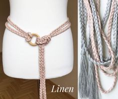 two different types of braided belts on a mannequin headdress, one in grey and the other in pink