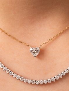 This beautiful diamond heart necklace is made to order. As always, we make a custom low profile basket for the heart diamond to sit in on a delicate 14K gold chain. It is perfect for wearing everyday on its own or layered with another necklace or two. 0.50ctw in stock is a G color SI2 clarity. Other sizes are custom made and can vary in color, clarity and cost. Available in 14K yellow, white or rose gold and the size of diamond vary based on your selection. This product is made to order and take Heart Diamond Necklace, Diamond Heart Necklace, White Gold Chain, Heart Necklace Diamond, Yellow Heart, Heart Diamond, Rose Gold Chain, Initial Jewelry, Stunning Necklace