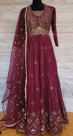 Beautiful Maroon floor length anarkali dress fully embroidered in georgette fabric,comes with matching net dupatta & strechable leggings. Anarkali Georgette Churidar For Navratri, Navratri Anarkali Churidar In Georgette, Eid Anarkali Set With Sheer Dupatta In Maxi Length, Diwali Anarkali Set With Sheer Dupatta, Maxi Length, Festive Churidar With Sheer Dupatta And Maxi Length, Diwali Maxi Length Anarkali Set With Sheer Dupatta, Diwali Sheer Dupatta Maxi-length Anarkali Set, Festive Floor-length Churidar With Sheer Dupatta, Diwali Sheer Dupatta Maxi Length Anarkali Set