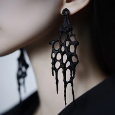 Celebrate Valentine's Day with a touch of gothic charm! Inspired by the intricate beauty of spider webs and the timeless allure of gothic architecture, our Gothic Drip Earrings add a bold, mysterious elegance to your romantic look. ✨ Why These Earrings Are the Perfect Valentine's Gift (or Treat Hypoallergenic Comfort: Crafted with hypoallergenic stainless steel posts, they're perfect for sensitive ears, offering all-day comfort on this special occasion. Featherlight Design: Made from high-qualit Gothic Designer Fashion, Resin 3d Printed Jewelry, 3d Printed Earrings Design, 3d Printed Accessories, Drippy Earrings, 3d Print Earrings, Ink Cap Mushroom, 3d Printer Jewelry, 3d Print Jewelry