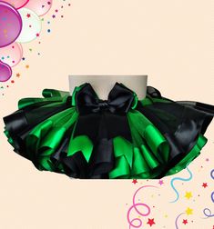 Black and emerald green tutu skirt, good for Halloween and any holidays.  Birthday party outfit.  For girls.   Ribbons trim tutu for girls and can be customized.   My tutus are all made by sewing and ironing.  It has a perfect finish. Rainbow Tutu Skirt. Baby girl tutu dress. Toddler girl tutu skirt. Toddler dress.  sunflower dress baby girl tutu skirt. Girl tutu dress. Tutu skirt for toddlers, babies, and girls.  Can be customized with the colors that you need it.  Christmas dress, first birthday party dress.  Black and Green tutu skirt. Ribbons Trim Tutu outfit. Birthday party outfit.  Baby girl tutu skirt. Tutus for girls. Toddler tutu skirt. The black and green tutu skirt for girls is a delightful and enchanting piece that will surely capture attention. It is carefully crafted using hi Green Tutu Skirt Outfit, Halloween Party Skirt With Ruffles, Halloween Party Ruffled Skirt, Green Christmas Party Tutu Dress, Cute Black Party Skirt, Green Ruffled Party Skirt, Green Ruffled Skirt For Party, Green Princess Tutu Dress For Party, Green Princess Style Party Tutu Dress