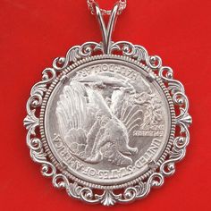 "You are looking at a gorgeous solid 925 sterling silver necklace with an authentic US Walking Liberty half dollar 90% silver AU coin. You have a choice to pick a year date between 1940 and 1947, and let me know if you want earlier year coin BUT no key dates and may not get AU coin before 1940. The coin is set with backside 4-prong, and you can see both sides of the coin. The pendant is made of solid 925 sterling silver, sized about 1.95\"(50mm) x 1.60\"(40mm), and heavy. It comes with a 20\" so Vintage Silver Coin Jewelry, Heirloom Silver Necklace With Coin Pendant, Classic Silver Necklace With Coin Pendant, Heirloom Silver Coin Jewelry, Classic Stamped 925 Medallion Jewelry, Vintage White Gold Coin Pendant Necklace, Classic Round Necklaces With Hallmark, Classic Silver Jewelry With Hallmark, Collectible Coin-shaped Silver Jewelry