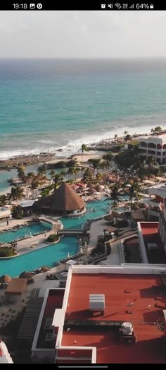 an aerial view of the beach and ocean from a high rise apartment building in miami