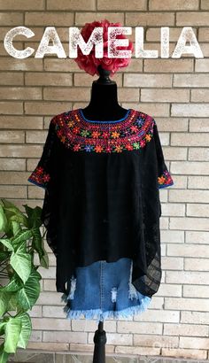 Guatemalan hand loomed and silk embroidered cover up. Perfect to use at the beach, pool or for daily wear over a tank top. Open sides and embroidery detail around neck and arms. Silk embroidery and cotton loomed thread. Made of 3 pieces of loomed fabric which are connected with thread. SIZE CHART: GUATEMALAN HUIPIL COVER UP WIDTH LENGTH ONE SIZE 37" 25" approximate measurements are in inches CARE:• Hand wash in cold water. • Lay flat to dry.• Do not iron. Please contact us if item is out of stoc Peasant Floral Embroidered Top For Beach, Bohemian Embroidered Hem Top For Beach, Embroidered Bohemian Tops For Beach Season, Bohemian Embroidered Blouse For Vacation, Traditional Summer Poncho For Festivals, Bohemian Embroidered Tops For Beach Season, Summer Beach Embroidered Top With Hem Detail, Summer Beach Top With Embroidered Hem, Beach Cotton Embroidered Top With Floral Embroidery