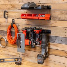 there are many tools hanging on the wall