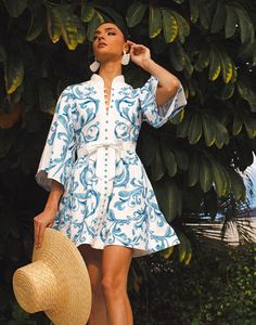 The Carmen Mini Dress is a printed linen mini dress with mandarin collar. Preppy Wedding Guest Dress, Coastal Outfits, Inexpensive Dresses, Sparkly Dresses, Italy Fits, Three Quarter Sleeve Shirt, Dress Styling, Graduation Pics, Dress Name