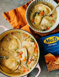 two bowls filled with soup next to a box of mashed potatoes