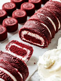 red velvet cookies with white frosting on top