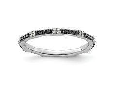 a white gold wedding band with black and white diamonds