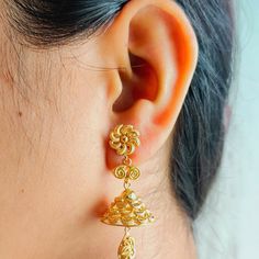 This is a beautiful 22k Real Gold pair of jhumka Earrings .  This is the perfect gift for mom, wife, fiancée, girlfriend, valentine, daughter, family or friend. It is a special gift for mother's day, valentine's day, wedding, anniversary, birthday, Christmas, Easter, New Year's and any holiday. 1. Material Details ✫ Gold : 22K (Real Gold) ✫ Gold Color Options: Yellow Gold ✰ Shape: floral ✰ Color: Yellow ✰ Weight: 9.301 grams approx. Terms & Conditions If there is any change. We request buyer to please inform us before item is shipped. After shipping we cannot accept any changes. Luxury Yellow Gold Jhumkas For Festivals, Luxury Yellow Gold Jhumkas As Gift, Indian Gold Earrings, 22k Gold Earrings, Gold Jhumka Earrings, Earrings Indian, Jhumka Earrings, Floral Color, Perfect Gift For Mom