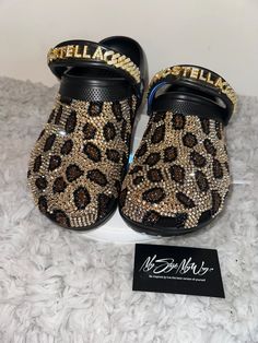 MyStyleMyWay's  custom crocs are designed for the perfect outfit, that special occasion, and "Just Because" you love blinged out crocs.  In the display shown we designed a pair of wheat  classic crocs adding high quality colorful rhinestones. 🐆Each Rhinestone is individually and neatly placed to achieve the design.  🐆Rhinestones are added to the top and buttom trimming of the shoe.  🐆Personality Patch is applied to this design to add cuteness and personality.  🐆This design was personalized. 🐆The holes are open on this custom for charms to be placed.  🐆The sports mode strap is also designed.   🐆This design do not have charms, charms can be added please contact us directly or visit our website www.MyStyleMyWay.co to view our charm selection.  🐆When making your purchase - You're makin Lv Custom Crocs, Leopard Crocs, Bedazzled Cow Print Crocs, Yellow Bedazzled Crocs, Customized Diamond Crocs Shoes, Designer Crocs, Nike High Heels, Crocs With Charms, Womens Clogs And Mules