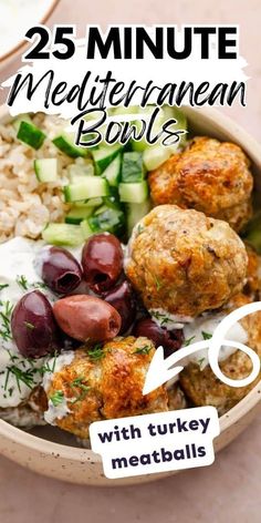 a bowl filled with meatballs, rice and veggies