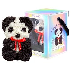 The image shows a black and white artificial flower panda with a heart-shaped arrangement of white flowers for the face and black flowers for the rest of the body. It has a red ribbon bow around the neck with the text Just for You. The panda is beside its holographic box packaging, which has a transparent window displaying another panda and the text always and forever with a Made with Love label. Pom Pom Bunnies, Gender Reveals, Expression Of Love, Always And Forever, Large Flowers, Gender Reveal, Baby Showers, Mother’s Day, Thoughtful Gifts