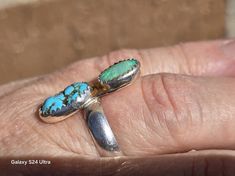 https://boonesilver.etsy.com/listing/1646372320 Morenci turquoise was mined in Arizona at the Morenci mine. It was closed decades ago and only found in private collections today. These small Morenci cabs are sky blue with natural pyrite. The cabs are stabilized. Perfect gift for wife. Ring size: 9 Lightning Ridge Opal: 1.25 ct, 8x10mm. Morenci turquoise: 3.75ct, 9x13mm. Hallmarked: MSBOONE 925 Spiritual Untreated Turquoise Ring Gift, Unique Turquoise Multi-stone Opal Ring, Unique Turquoise Opal Ring With Multi-stone Design, Unique Turquoise Ring Gift, Oval Multi-stone Turquoise Ring Gift, Artisan Untreated Turquoise Ring As Gift, Unique Turquoise Opal Ring For Anniversary, Unique Turquoise Opal Ring For Gift, Handmade Turquoise Opal Ring With Unique Style