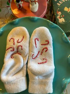 "Jumbled Candy Canes.  Perfect for opening Christmas Eve, or Christmas morning - keep your toesies cozy while presents are being opened!  Multiple variations are available - See my other listings. READY TO SHIP! Just let me know what name you would like painted on the toe of the sock. Socks with a personality. The designs on these socks make them no-slip.  PLEASE NOTE: This means the design on the sock is painted on the bottom! CARE INFO: I use only better socks known for their durability. They Cute Christmas Gift Socks, White Winter Gift Socks, White Socks For Winter Gifts, White Winter Socks As Gift, Comfortable Socks For Winter Playtime, Comfortable Socks For Playtime In Winter, Comfortable Winter Socks For Playtime, Cozy White Socks For Gifts, Cozy White Socks As Gift