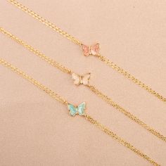 Our 14K Gold Butterfly Bracelet is a dainty and enchanting piece, perfect for adding a touch of whimsy and color to your jewelry collection. Each bracelet features intricately crafted butterfly charms, detailed with vibrant enamel in shades of blue, pink, or white. These charms, measuring 9mm x 6mm, are set against the backdrop of lustrous 14K gold, available in your choice of Gold, Rose Gold, or White Gold. The adjustable length of 6.5" to 7.75" ensures that the bracelet can comfortably fit a v Butterfly Bracelet, Gold Butterfly, Butterfly Charm, Jewelry For Her, Butterfly Design, Exquisite Jewelry, White Enamel, Elegant Jewelry, Gold Rose