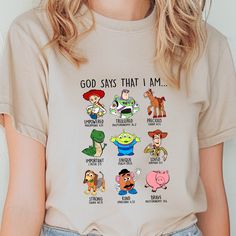 Title: God Says I Am Shirt, God Shirt, Toy Story Lover Shirt, Christian Shirt, Bible Verse Shirt, Religious Gifts, Christian Shirt, Toy Story Shirt Brand Detail: Introducing the soft and stylish Gildan 64000 Fitted T-Shirt, made with 7.5 oz. of 100% cotton. It's got a specific Euro Pattern with a fashion fit in the neck, shoulders and sleeves. The 64000 Fitted T-shirt is one of Gildan's most popular additions to their incredible line up of inexpensive and high-quality garments. With new slim fit Toy Story Mom Shirt, Funny Character Print Tops For Playtime, Cute Shirt With Character Print For Playtime, Cute Character Print Shirt For Playtime, Toy Story His And Her Shirts, Father Son Toy Story Shirt, Friends Toystory Shirt, Toy Story Burthday Shirts, Toy Story Disney Shirt