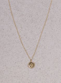 ALANA MARIA JEWELLERY - Featuring their plain chain, this gorgeous necklace is an everyday staple. This alluring design is the perfect touch to any outfit, exuding understated elegance this pendant necklace is timeless. 18 inches - 45.70 cm - Featuring our 14k gold-filled plain chain- Clasp fastening - Gold vermeil pendant Everyday Yellow Gold Necklace With Flower Pendant, Delicate Round Necklace With Delicate Chain, Classic Jewelry With Delicate Chain Medallion, Classic Necklace With Oval Pendant And Adjustable Chain, Everyday Necklace With Delicate Round Chain, Everyday Elegant Gold Plated Medallion Necklace, Classic Charm Necklace With Delicate Chain And Round Pendant, Timeless Long Necklace With Delicate Chain, Everyday Delicate Chain Necklace With Initial Pendant