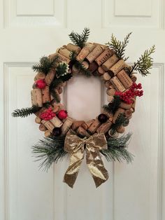 a wine cork wreath hanging on the front door