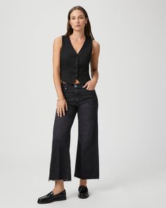 This modern high-waisted wide leg has an easy, relaxed fit and an ankle length silhouette. This style is cut from our PAIGE Vintage denim and comes in a vintage black wash with whiskering, fading, and a raw hem. PAIGE Vintage takes all of the work out of breaking in your favorite pair of vintage jeans. We've combined the comfort of stretch with everything you love about authentic vintage denim to create super soft jeans that feel perfectly lived-in from the very first wear. | Anessa Wide Leg Jea Black Cropped Jeans With Frayed Hem For Fall, High Rise Black Cropped Jeans With Frayed Hem, Black High-rise Cropped Jeans With Frayed Hem, Black High Rise Cropped Jeans With Frayed Hem, Chic Flare Jeans With Frayed Hem For Work, Chic Black Cropped Jeans For Spring, Chic Washed Black Jeans For Spring, Chic Cropped Dark Wash Bottoms, Casual Black Cropped Jeans With Frayed Hem