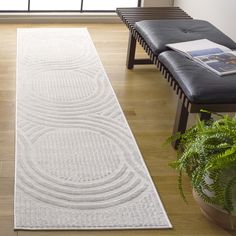 Elevate your home decor with our sleek and versatile ivory runner rug. Measuring 2'-0" x 8'-0" with a comfortable height of 1/2", this runner is an ideal choice for high-traffic areas, adding a touch of elegance without dominating your space. Crafted with meticulous care in Turkey, this runner rug boasts a sophisticated modern style that seamlessly integrates with contemporary interiors. The power-loomed construction offers a refined look, combining durability with a soft-to-the-touch feel thank Solid Color Rug, Classical Design, Color Rug, Rugs Usa, Contemporary Interiors, Exquisite Rugs, Solid Colour, Transitional Style, Indoor Area Rugs