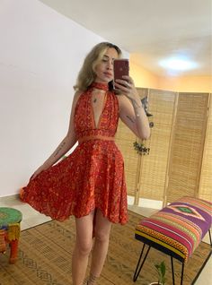 this silky bohemian dress is so adjustable! you can tie it is many many ways and styles️ it's a one loss size, dress has an elastic waist and ties to fit your body 🌱 fabric is soper soft and light  good form xs-small l ️ model is 1.67 cm high  thanks  💜 Hippie Hoco Dresses, Boho Print Halter Neck Sundress, Flowy Tie Back Mini Dress, Flowy Mini Dress With Tie Back, Festival Boho Print Halter Neck Dress, Beach Mini Backless Dress With Tie Back, Backless Mini Dress With Tie Back For Beach, Halter Neck Boho Dress With Boho Print For Festival, Festival Halter Neck Boho Dress With Boho Print