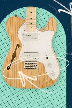 an electric guitar is shown on a blue background