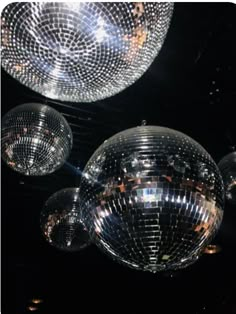 shiny disco balls hanging from the ceiling