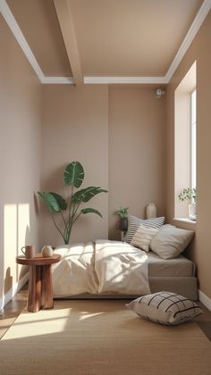 a room with a bed, table and potted plant on the floor in it