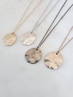 "Simple Geometric Wave Plate Pendant Long Necklace Chain Length: 24″ + 2\" Adjustable Extension. Total 26\" Clasp: Yes Type of Clasp: Lobster Claw Pendant Length: 7/8\" Pendant Width: 3/4\" Weight: 6g Metal: Rhodium or gold plated chain, brush metal pendant, tarnish resistant Options: Silver Gold  Gunmetal Champagne" Everyday Metal Jewelry With Large Pendant, Silver Brass Necklace With Adjustable Chain, Everyday Brass Teardrop Necklace, Everyday Teardrop Brass Necklace, Silver Brass Chain Necklace With Delicate Chain, Nickel-free Metal Necklaces For Everyday, Silver Brass Medallion Necklace, Everyday Metal Necklaces Nickel Free, Everyday Metal Nickel-free Necklaces