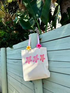 Our Sunhoney Hibiscus Tote Bag is the perfect summer time essential. Say hello to your new favorite beach, grocery, weekend tote bag! This tote features our classic hibiscus flower with Sunhoney underneath with classic canvas material, pink straps, gusset bottom and hold all the essentials and more! 100% Cotton All accessories are final sale. Pink Cotton Beach Bag For Vacation, Beach Bags Aesthetic, Summer Pink Cotton Beach Bag, Pink Summer Cotton Beach Bag, Pink Cotton Canvas Beach Bag, Pink Cotton Summer Beach Bag, Pink Cotton Canvas Bag For Vacation, Pink Cotton Canvas Bag For Summer, Pink Canvas Bag For Summer