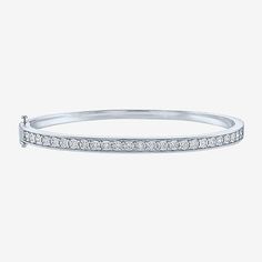 This elegant bangle, featuring 25 Lab-Grown diamonds, is available in two options, sterling silver and 14K gold over silver. Its sleek and modern design makes the piece ideal as a standalone or create an eye-catching stack with other bracelets.Features: Quick ShipCircumference: 7 1/4 InchDiamond Clarity: I1-I2Setting: NickStone Cut: RoundDiamond Color: G-HMetal Color: WhiteChain Width: 5 MillimetersRounded Carat Weight: 1/2 Ct. T.w.Care: Wipe CleanStone Type: 25 Lab Grown DiamondAuthenticity: La White Diamond Jubilee Bangle Bracelet, Classic White Sterling Silver Bangle, Classic White Sterling Silver Bangle Bracelet, White Sterling Silver Bangle Bracelet, Modern White Diamond Bangle Bracelet, White Stackable Diamond Bracelet, Classic White Bangle Jewelry, Classic White Bracelets With Diamond Accents, Modern White Bracelets With Diamond Accents