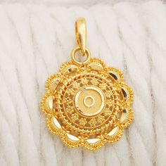 Please click -- Learn more about this item -- below for a full description 22k gold pendant handmade jewelry made in India weight is 2.46 grams approx. length is 2.4 centimeter approx. width is 1.7 centimeter approx. Yellow Gold Round Pendant Jewelry For Diwali, Yellow Gold Round Pendant For Puja, Yellow 22k Gold Round Pendant Jewelry, Yellow Gold Round Pendant Necklace For Puja, Gold Pendant Jewelry Indian, 22k Gold Chain, Locket Design, Round Locket, Gold Pendant Jewelry