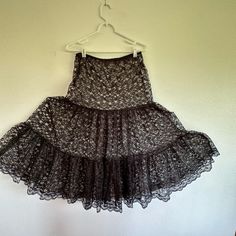 Three Tiers Of Black Lace Create A Slip Or Creative Over-Skirt. Additional Strip Of Lace Creates The Hem. Length Is About 30.5. Elastic Waist Is 15.5 X 2. Fitted Tiered Black Skirt, Black Fitted Tiered Skirt, Fitted Black Tiered Skirt, Black Ruffled Tiered Skirt Petticoat, Black Tiered Skirt Petticoat For Summer, Fitted Tiered Petticoat, Black Tiered Skirt Petticoat With Attached Cancan, Black Tiered Petticoat With Attached Cancan, Lingerie Gown