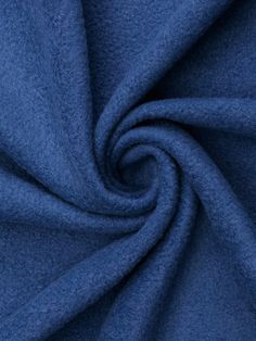 a close up shot of a blue fabric