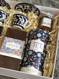 an assortment of teas and chocolates in a box